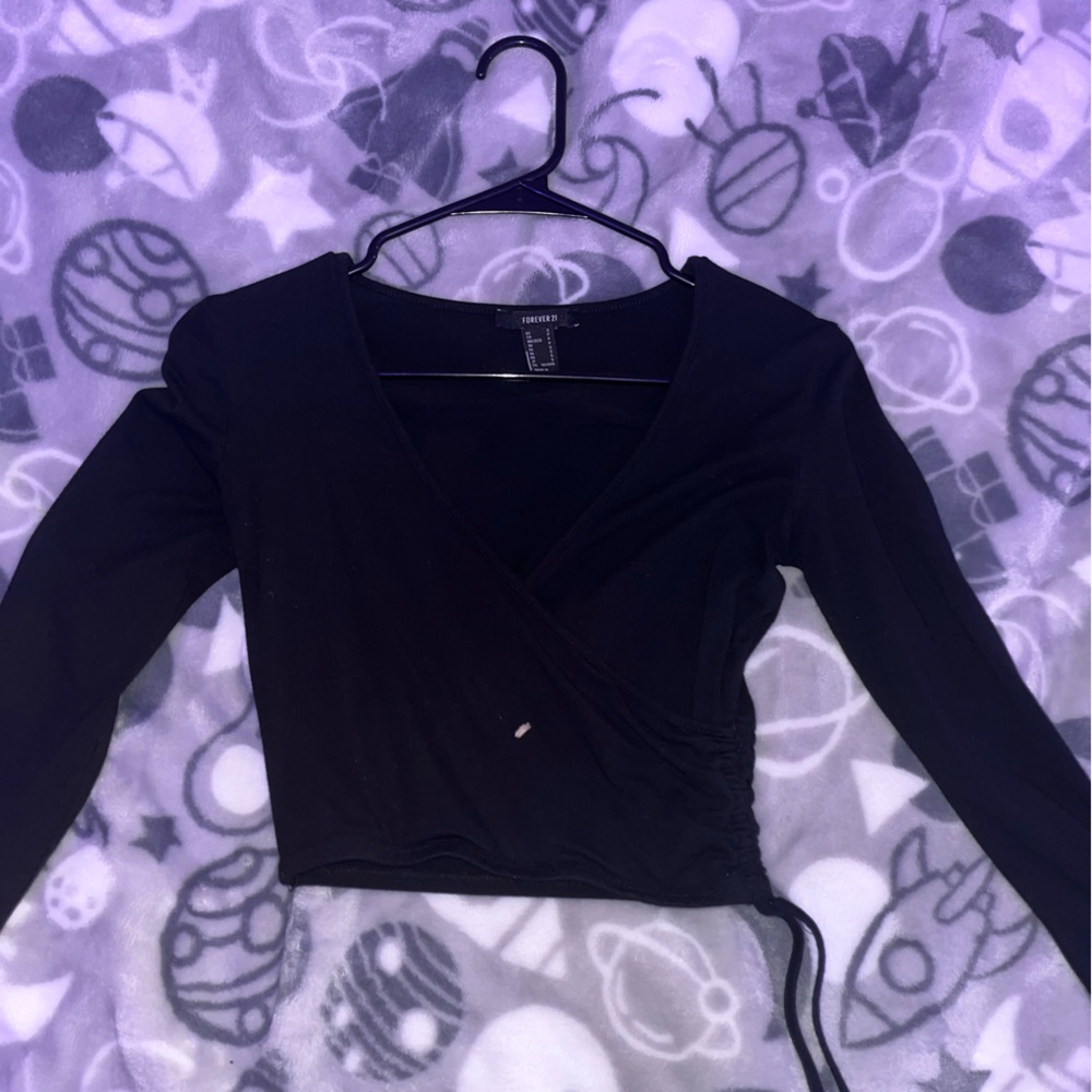 black long sleeve crop-top cross  from front